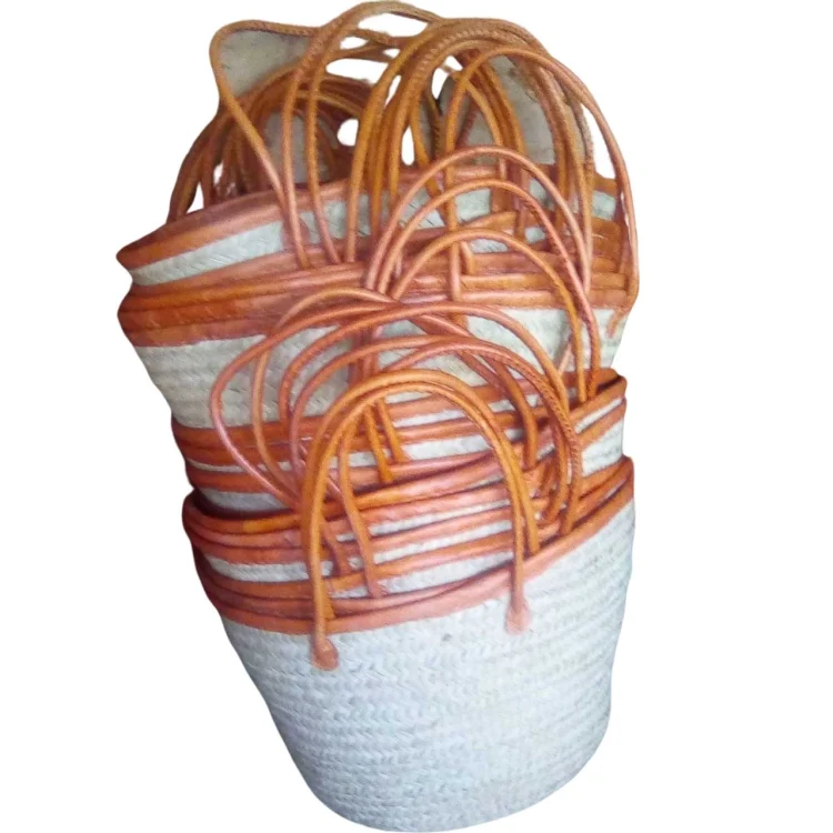 Jorova palm leaf basket with leather rim and handles